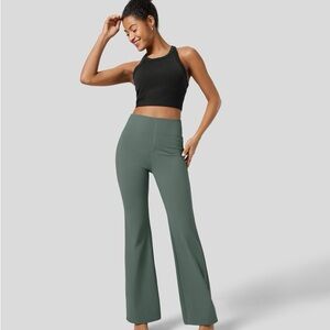 NWT Halara Women's High-Waisted Green Flare Pants with back pockets
